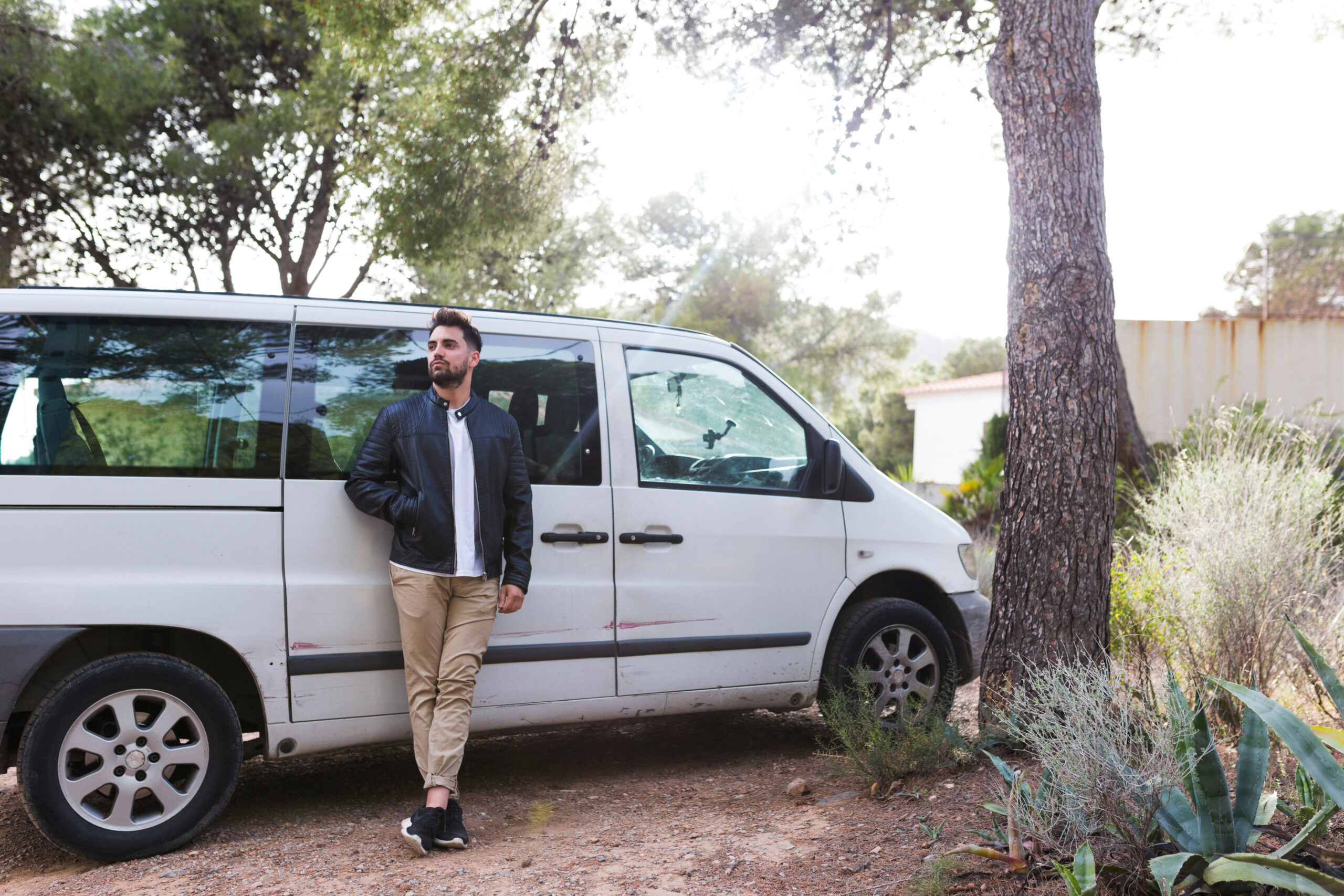 man-leaning-front-car-1